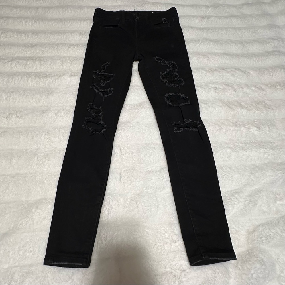 Woman’s American Eagle Ripped Style Black Skinny High Rise Jeggings